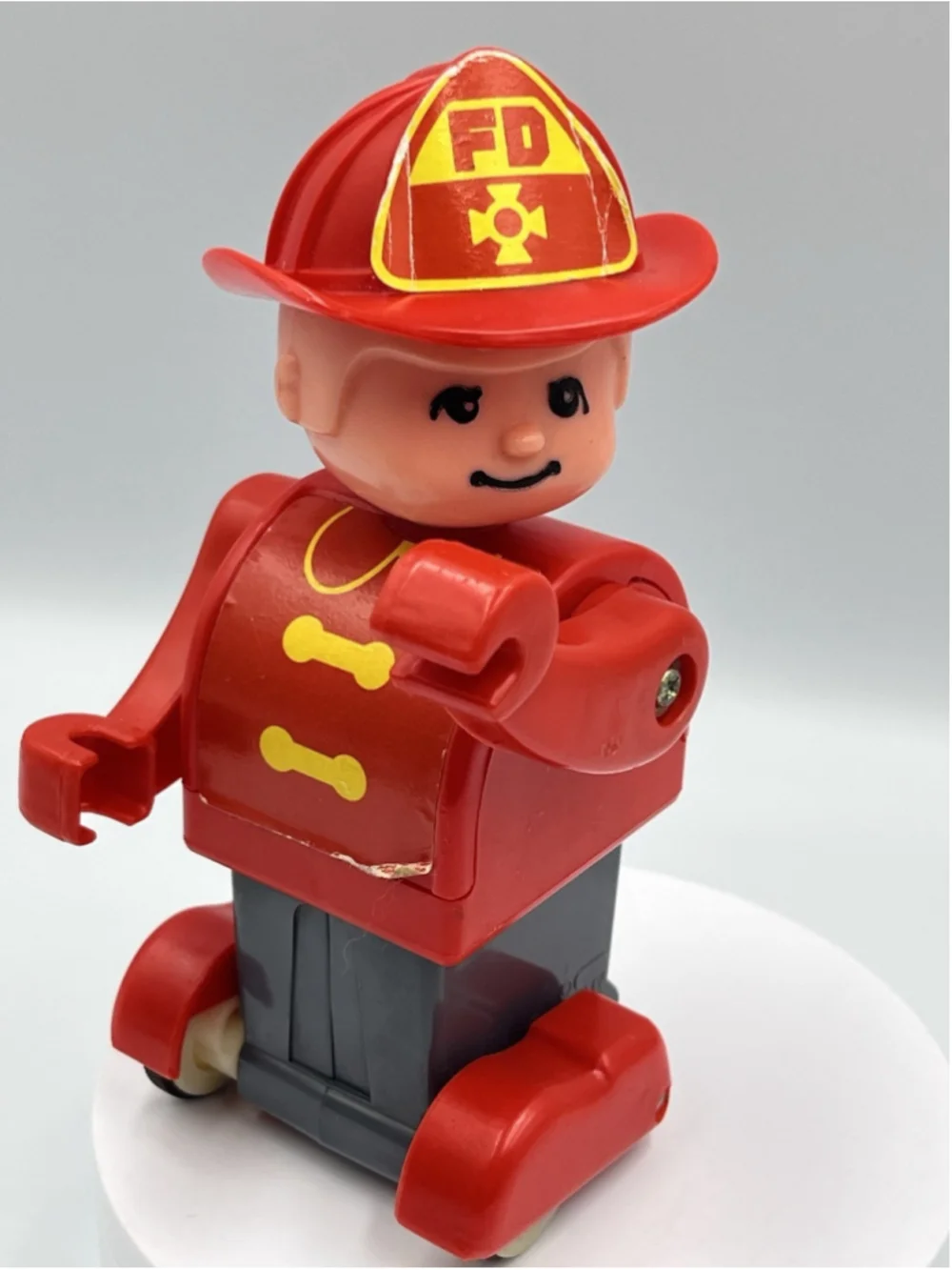 VINTAGE PUSHKINS Vintage Fire Man TOMY 1976 Push N Go Action Figure